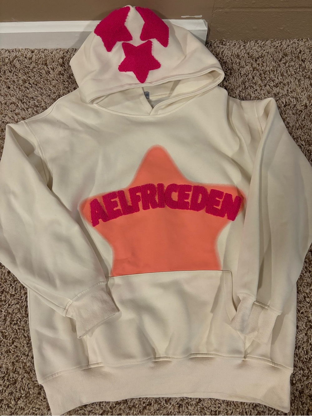 Aelfric Eden XS Cream Hoodie with Pink Accents and Orange Star Detail